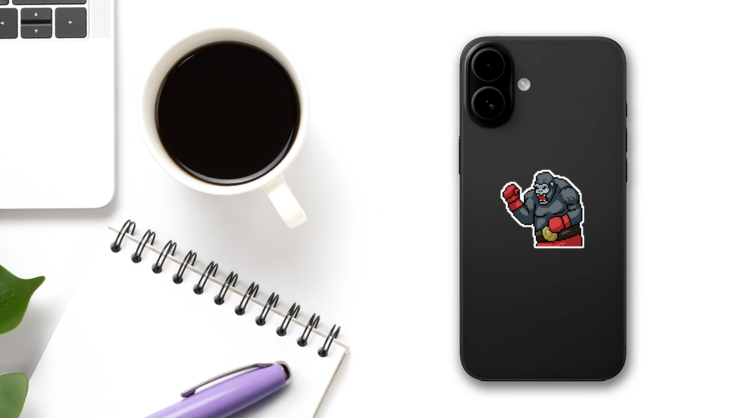 Pixel Boxing Gorilla Sticker on a Phone (New) example