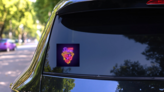 Pizza Love Neon Sign Sticker on a Rear Car Window (New) example