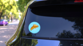 Pizza Sunburst Illustration On Blue Sticker on a Rear Car Window (New) example