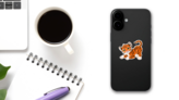 Playful Tiger Cub Sticker on a Phone (New) example