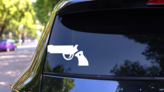 Police Gun Sticker on a Rear Car Window (New) example