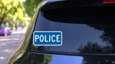 Police Sticker on a Rear Car Window (New) example