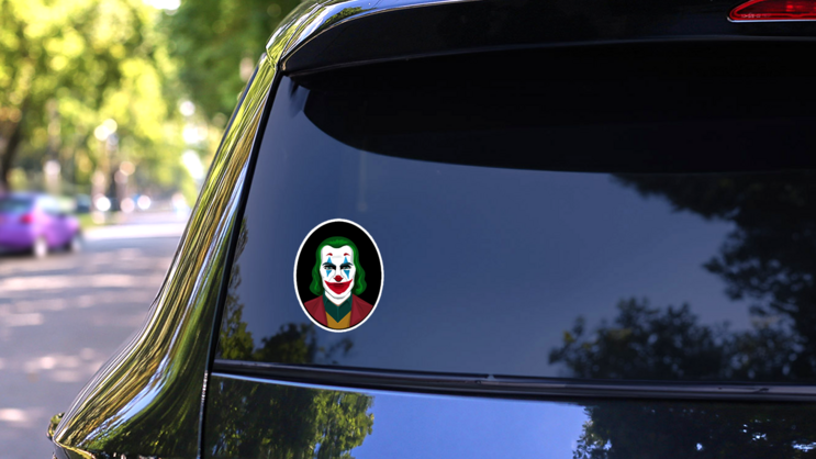 Portrait Of A Clown With Green Hair And Red Nose Sticker on a Rear Car Window (New) example