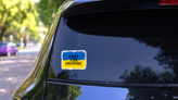 Pray For Ukraine Flag Brush Sticker on a Rear Car Window (New) example