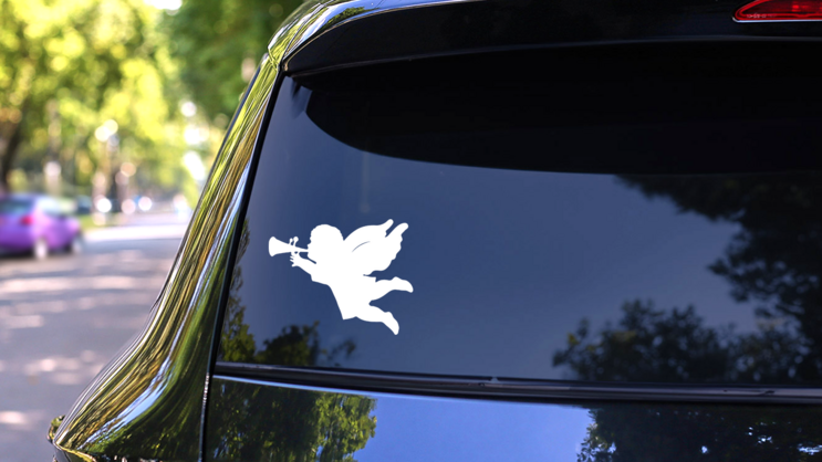 Precious Angel Blowing Horn Sticker on a Rear Car Window (New) example