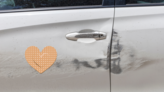 Pretty Heart Band Aid Bandage Sticker on a Scratched Car example