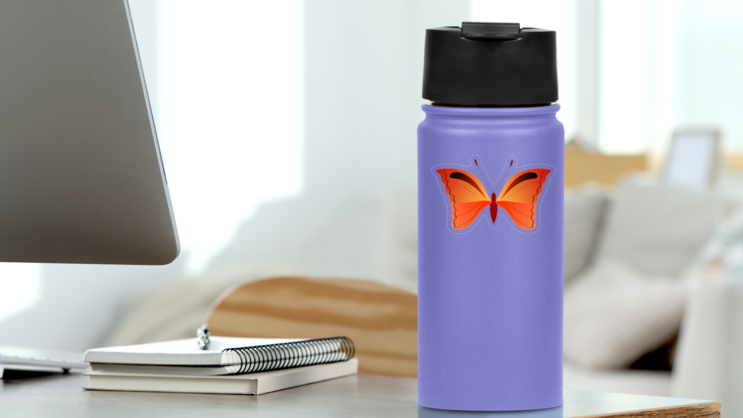 Pretty Orange Butterfly Sticker on a Water Bottle (New) example