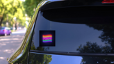 Pride Neon Text Sticker on a Rear Car Window (New) example