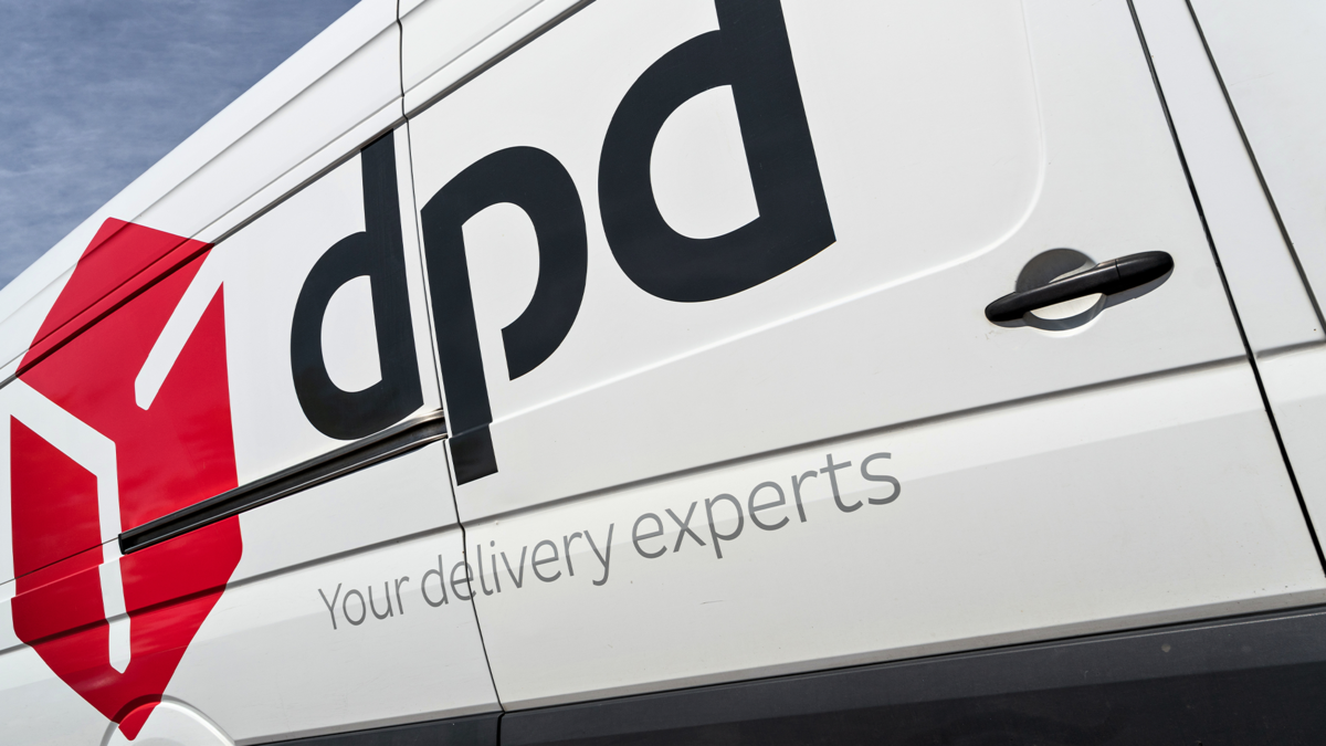 Van with Custom Printed Transfer Decal to Promote Company Applied to the Side