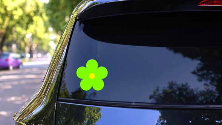 Printed Lime Green Daisy Flower Sticker on a Rear Car Window (New) example