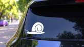 Quiet Snail Sticker on a Rear Car Window (New) example