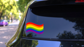 Rainbow Freedom Flag Stickers on a Rear Car Window (New) example