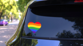 Rainbow Heart Flag Sticker on a Rear Car Window (New) example
