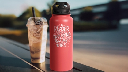 Reading quote engraved on custom 34 oz water bottle