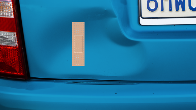 Rectangle Band Aid Bandage Sticker on a Dented Car example