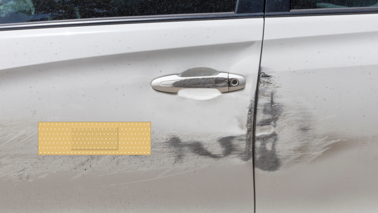 Rectangular Band Aid Bandage Sticker on a Scratched Car example