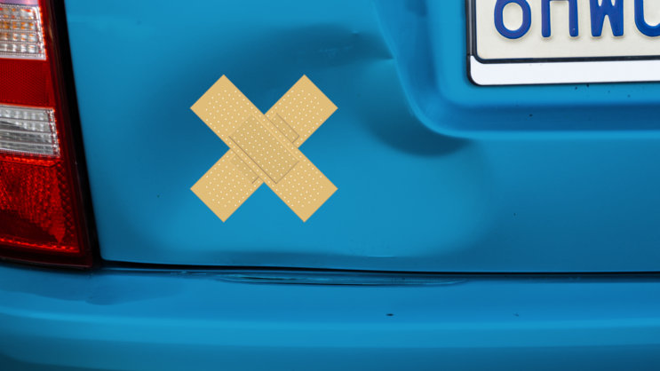 Rectangular Crossed Band Aid Bandage Sticker on a Dented Car example