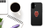 Red Devil Head Scary Sticker on a Phone (New) example