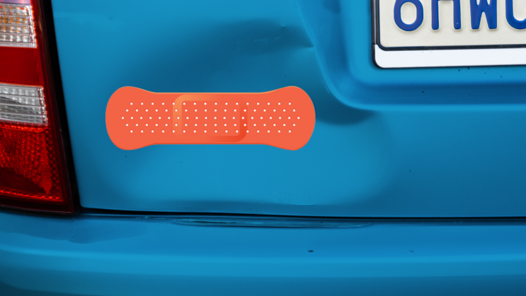 Red Orange Band Aid Bandage Sticker on a Dented Car example