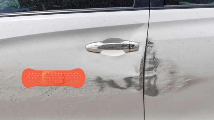 Red Orange Band Aid Bandage Sticker on a Scratched Car example