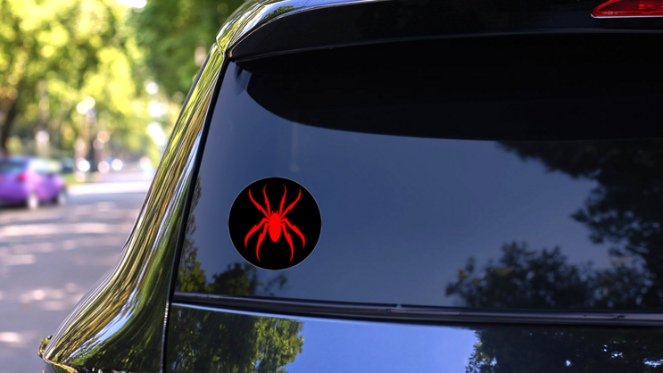 Red Spider Circle Sticker on a Rear Car Window (New) example