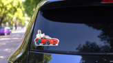 Red Sports Car and Salesman Sticker on a Rear Car Window (New) example