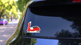 Retro Red Electric Scooter Sticker on a Rear Car Window (New) example