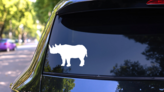 Rhinoceros Body Sticker on a Rear Car Window (New) example