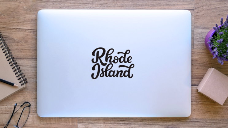 Rhode Island Calligraphy Sticker on a Laptop (New) example