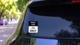 Right Lane Bikes Only Sticker on a Rear Car Window (New) example