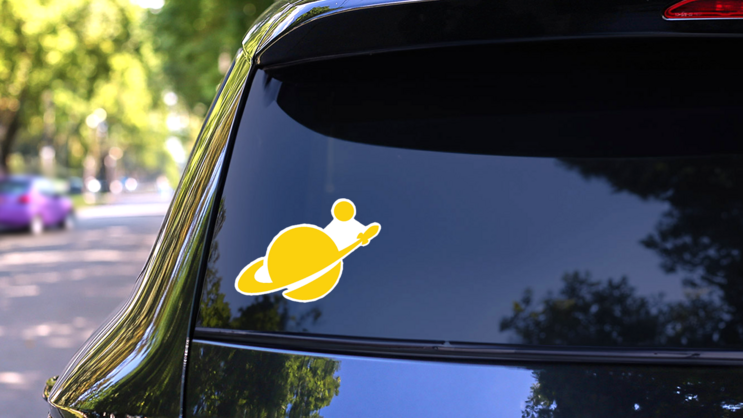Rocketing Orbiting Planet Silhouette Sticker on a Rear Car Window (New) example