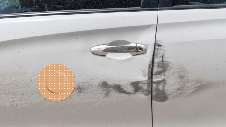 Round Band Aid Bandage Sticker on a Scratched Car example