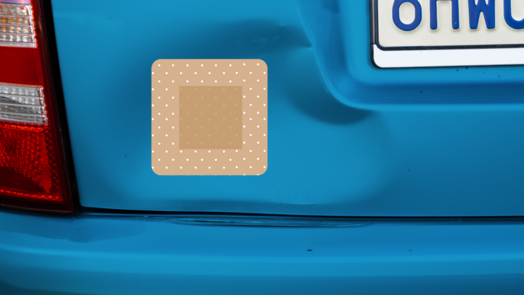 Rounded Corner Bandage Sticker on a Dented Car example