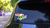 Running 100 Metres Dash Athletics Summer Games Sticker on a Rear Car Window (New) example