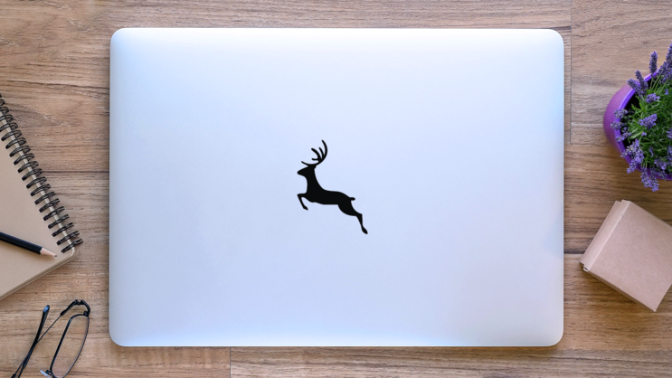 Running Deer Silhouette Sticker on a Laptop (New) example