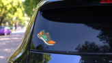Running Shoes Fitness Icon Sticker on a Rear Car Window (New) example