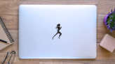 Running Woman Silhouette Sticker on a Laptop (New) example