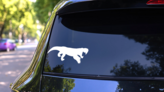 Saber Toothed Tiger Sticker on a Rear Car Window (New) example