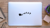 Santas Sleigh With Four Reindeer Sticker on a Laptop (New) example