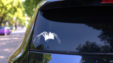 Scarry Standing Spider Sticker on a Rear Car Window (New) example