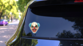 Scary Blue Clown Sticker on a Rear Car Window (New) example