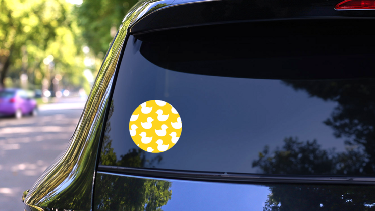 Seamless Pattern Of White Bath Duck Toy Silhouette On Yellow Sticker on a Rear Car Window (New) example