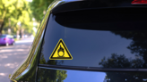 Self Ignition Sign Sticker on a Rear Car Window (New) example