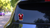 Sexy Vintage Pinup She Devil Cartoon Sticker on a Rear Car Window (New) example