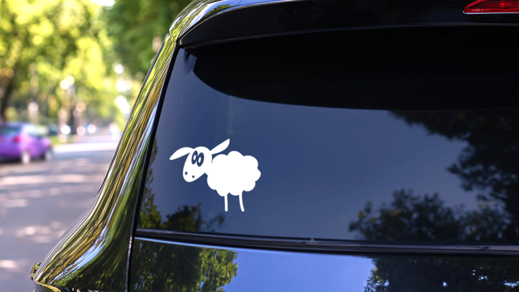 Sheep Lamb With Ear Sticking Out Sticker on a Rear Car Window (New) example
