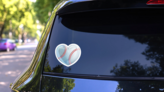 Shiny Heart Baseball Sticker on a Rear Car Window (New) example