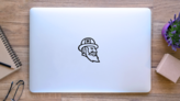 Side View of an Irish Mascot Transfer Sticker on a Laptop (New) example
