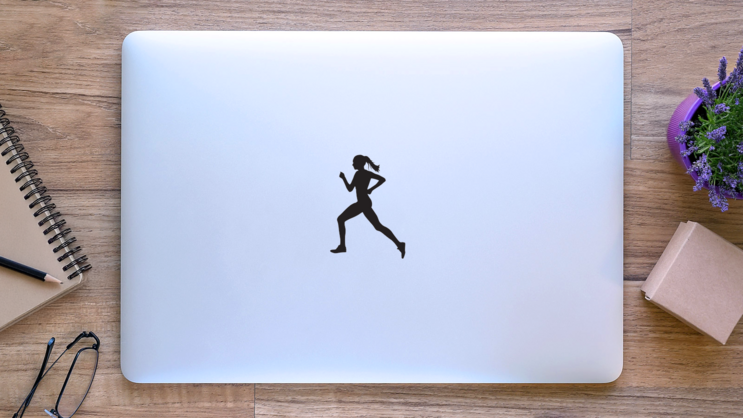 Side View Running Woman Sticker on a Laptop (New) example