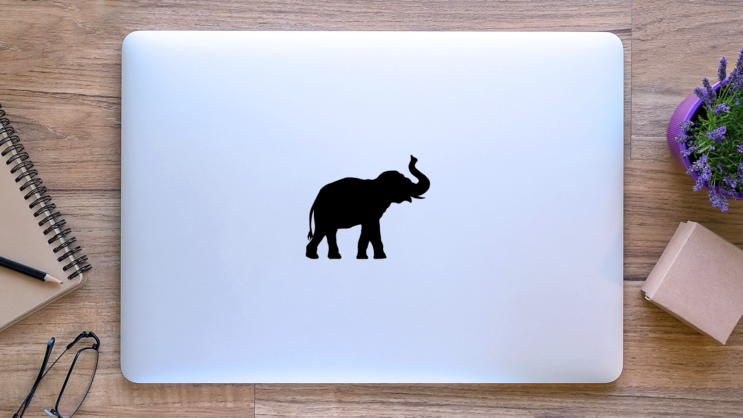 Silhouette Of An Elephant Sticker on a Laptop (New) example