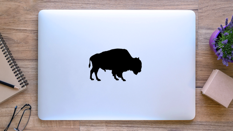 Silhouette Of Buffalo Sticker on a Laptop (New) example